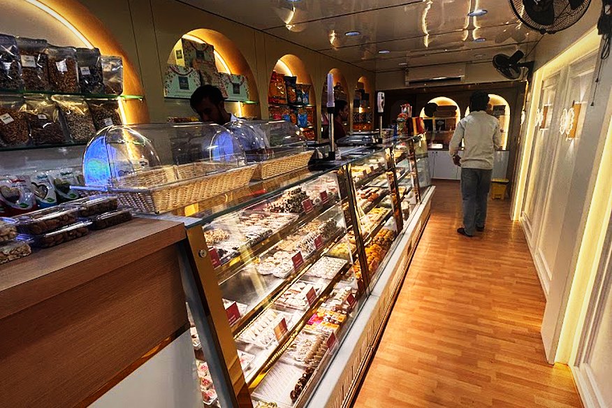 The long glass counter running the length of the shop
